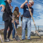 The Hamstra team planting a tree.