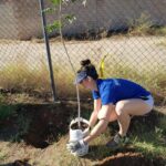 Planting a tree with Hamstra.