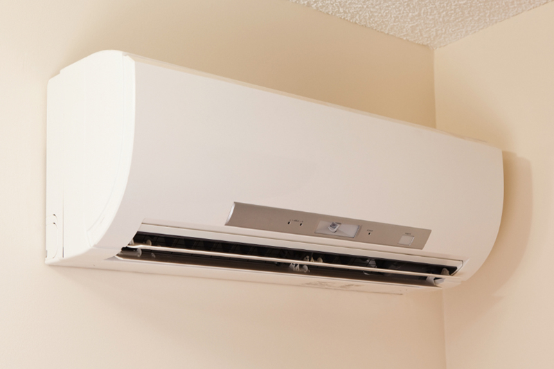 How Does a Ductless AC Work? Photo of an HVAC unit mounted on a wall.